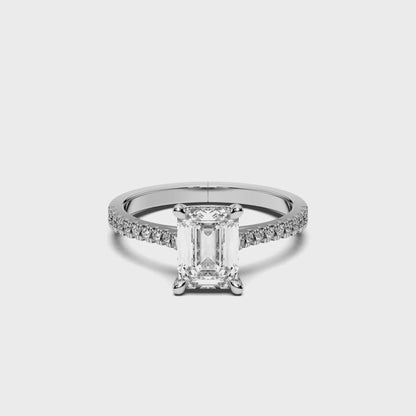 EMERALD HIDDEN HALO WITH SIDE STONE 3.00 CTTW