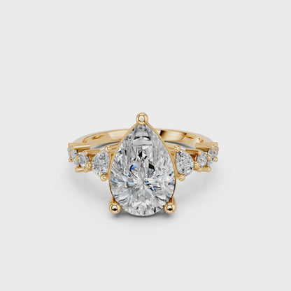 PEAR ENGAGEMENT RING WITH SIDE STONE  3.00 CTTW